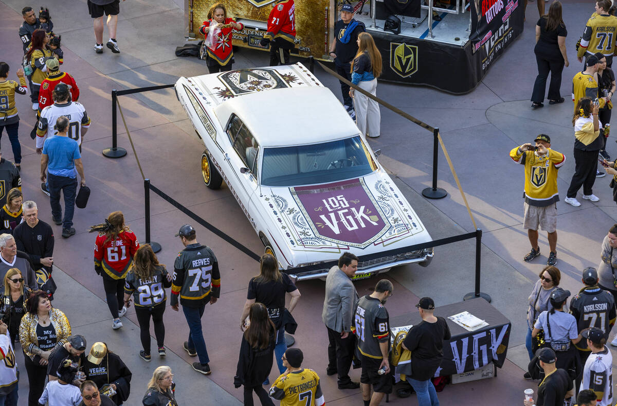 Fans check out a low rider astray ready to enter the arena as the Golden Knights will face the ...