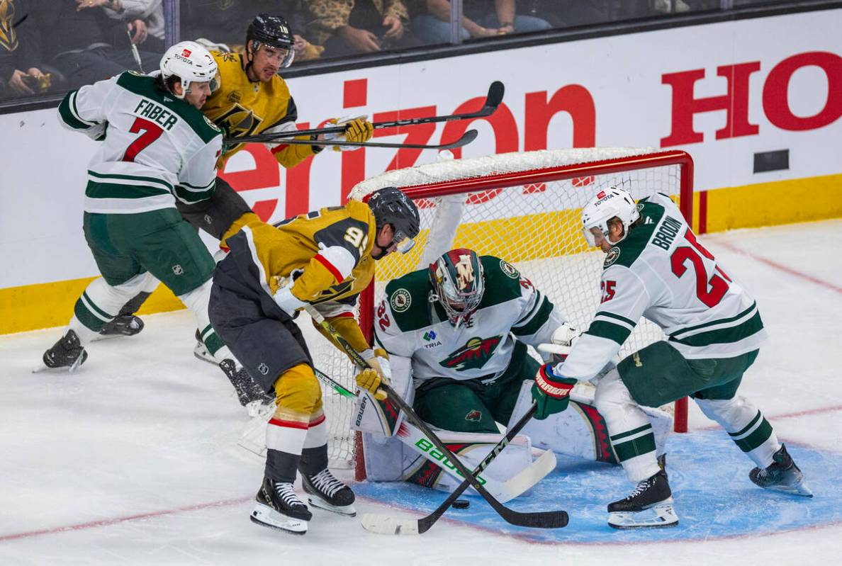 Golden Knights right wing Victor Olofsson (95) attempts to score against Minnesota Wild goalten ...