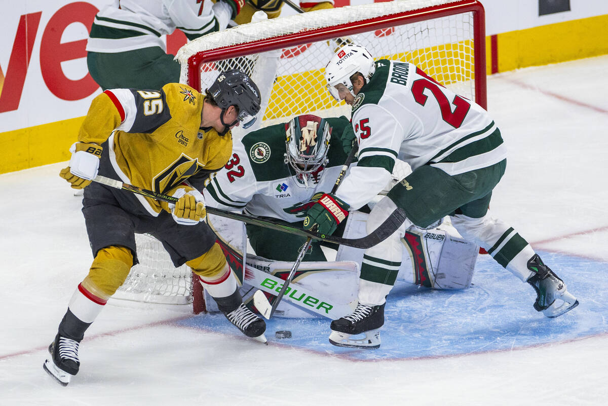 Golden Knights right wing Victor Olofsson (95) attempts to score against Minnesota Wild goalten ...