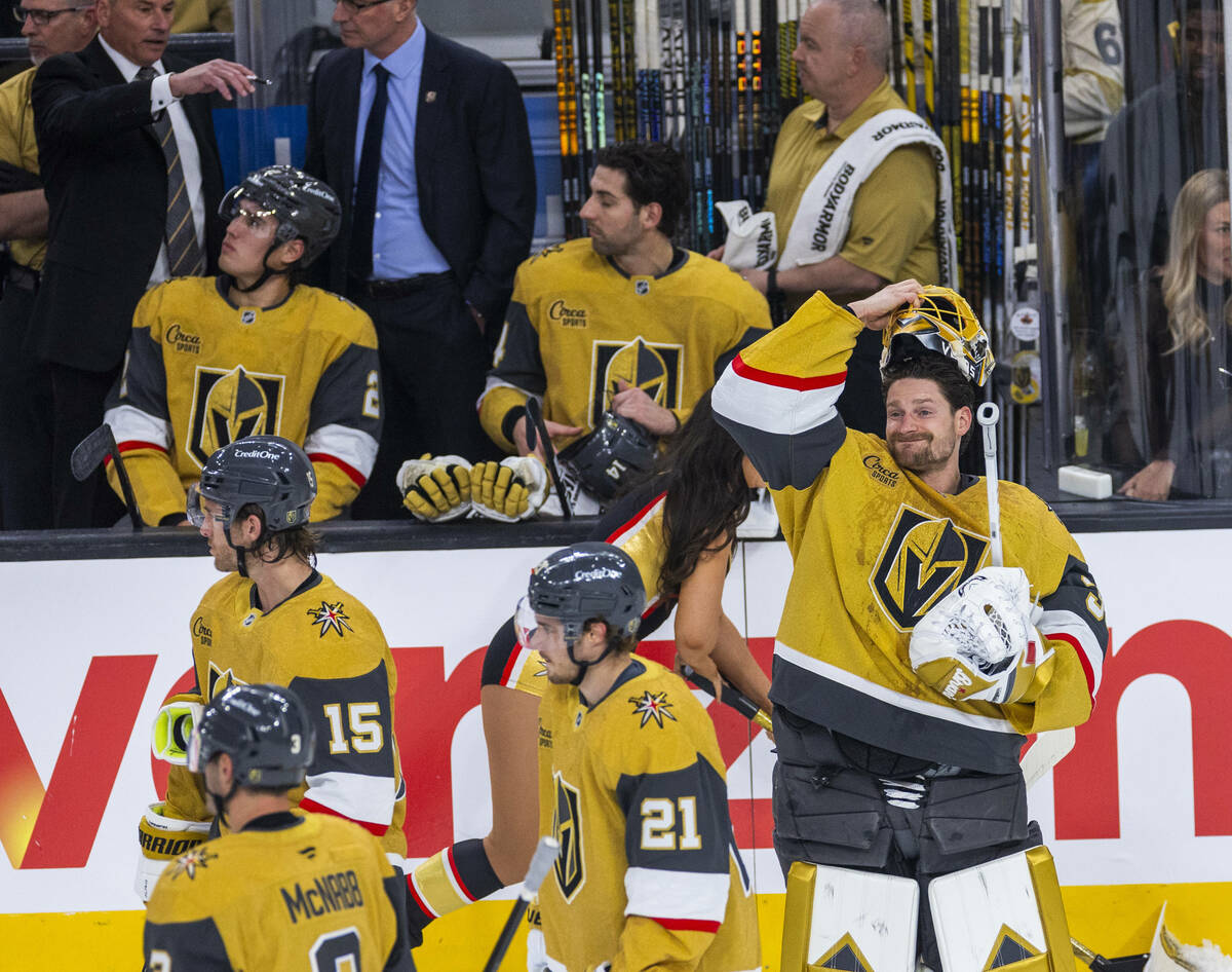 Golden Knights goaltender Adin Hill (33) readies for another go against the Minnesota Wild af ...