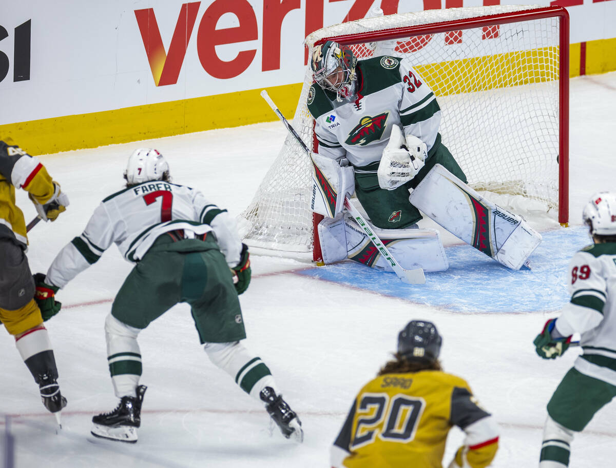 The Golden Knights score against Minnesota Wild goaltender Filip Gustavsson (32) during the fir ...