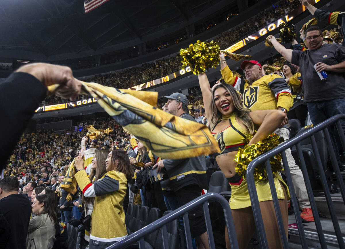 A member of the Vegas Vivas celebrates a goal by the Golden Knights during the first period of ...