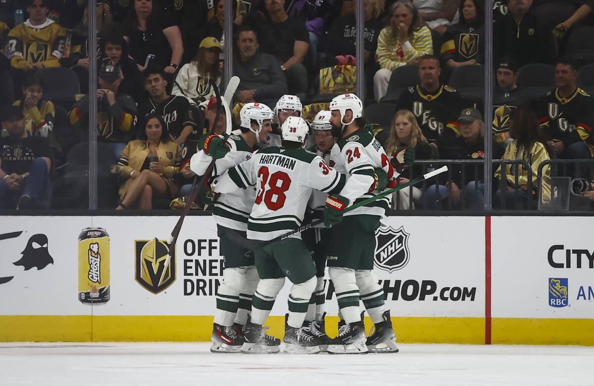 The Minnesota Wild celebrate a goal against the Golden Knights during the first period of their ...