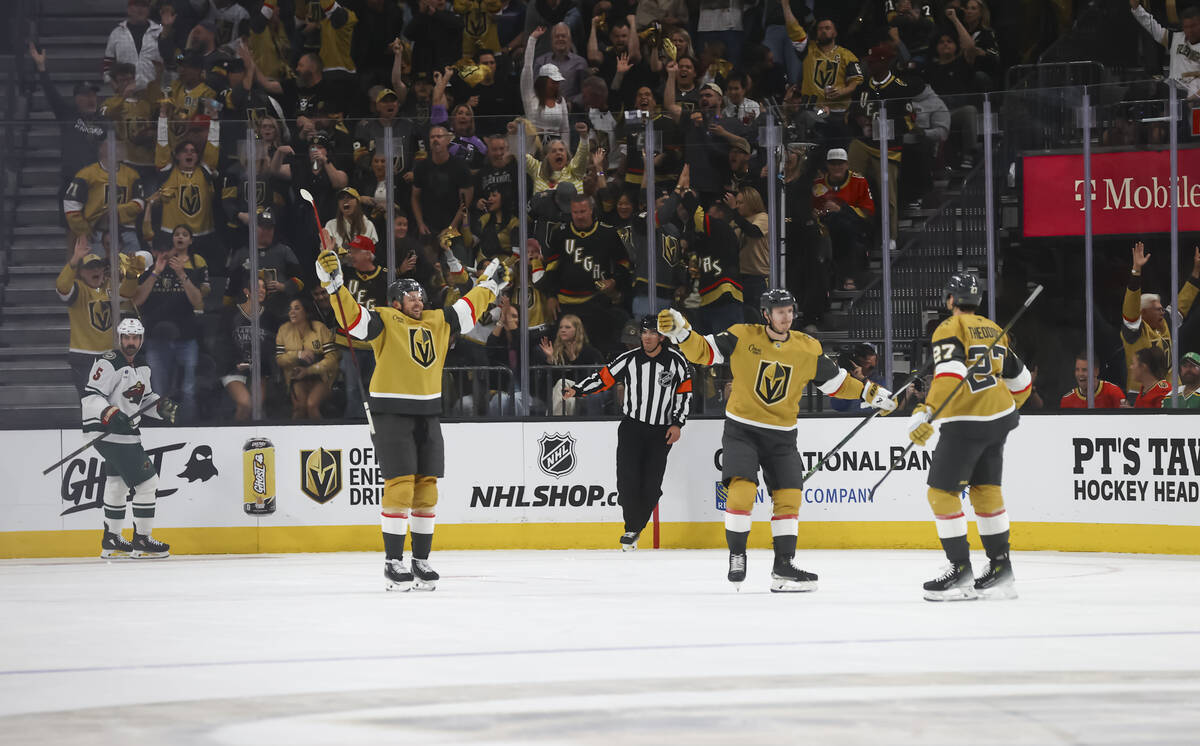 The Golden Knights celebrate a goal by Golden Knights left wing Pavel Dorofeyev during the seco ...