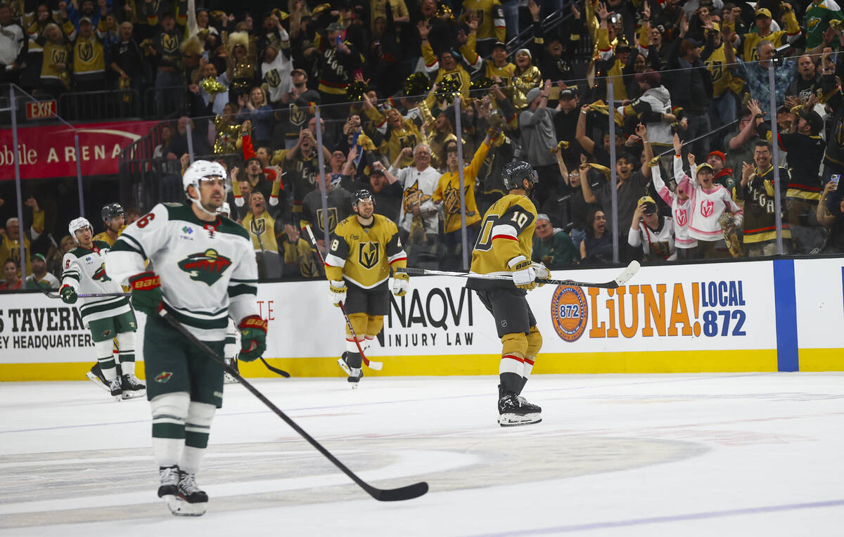 The Golden Knights celebrate their victory over the Minnesota Wild in a first-round NHL hockey ...