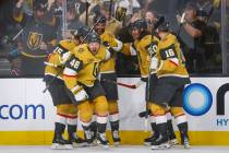 Golden Knights center Tomas Hertl (48) celebrates his goal against the Minnesota Wild with team ...