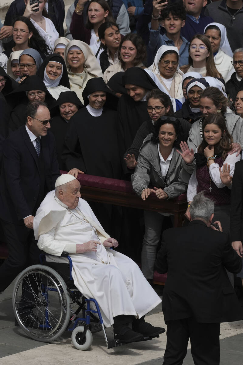 Pope Francis arrives at the end of the mass on Palm Sunday in St. Peter's Square at The Vatican ...