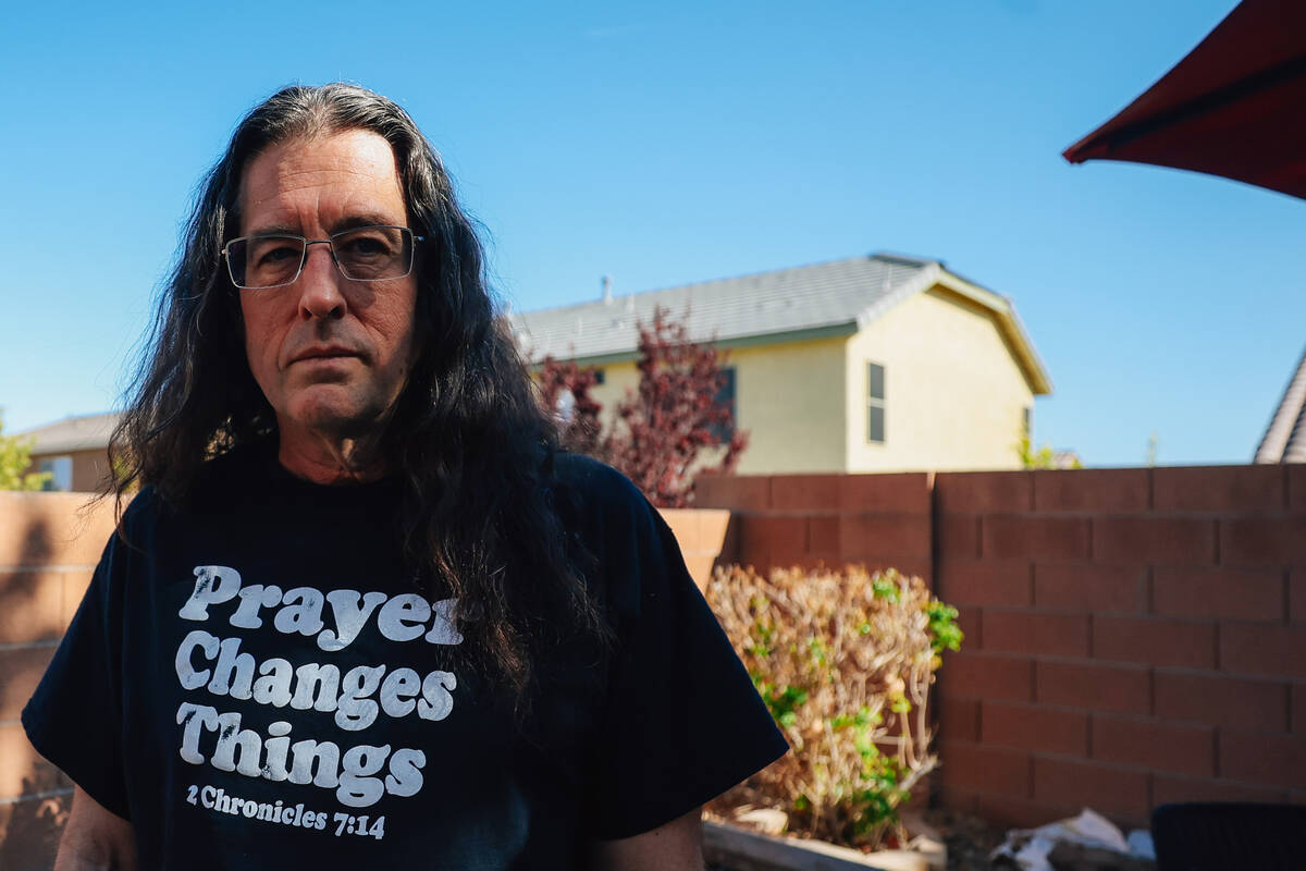 Scott Johnson stands for a portrait at Danielle Carter’s home Sunday, April 6, 2025, in ...