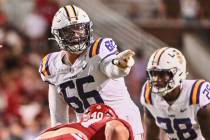 FILE - LSU offensive lineman Will Campbell (66) gets ready to run a play against Arkansas duri ...
