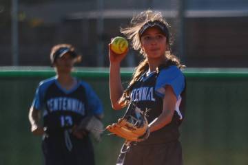 Centennial infielder Valeria Lopez (5) winds up to toss the ball to the pitcher during the soft ...