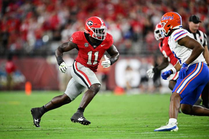 Georgia linebacker Jalon Walker (11) follows a play against Florida during the second half of a ...