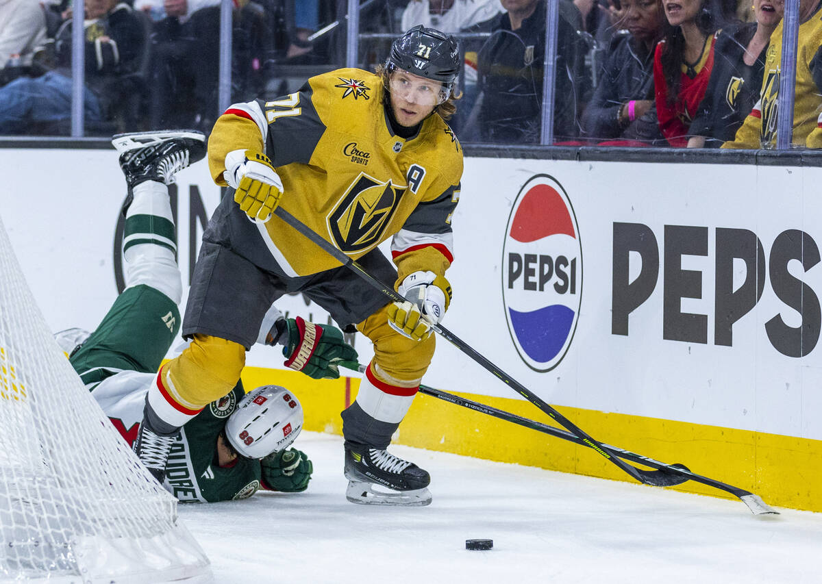 Golden Knights center William Karlsson (71) looks to pass inside as Minnesota Wild center Frede ...