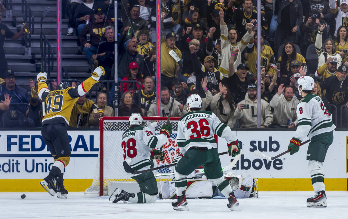 Golden Knights center Ivan Barbashev (49) helps to celebrate their first goal against Minnesota ...