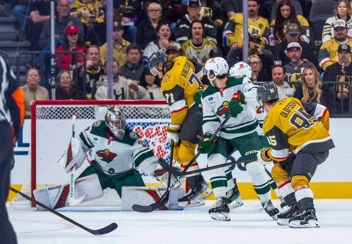 Golden Knights center William Karlsson (71) takes a shot but is blocked by Minnesota Wild goalt ...
