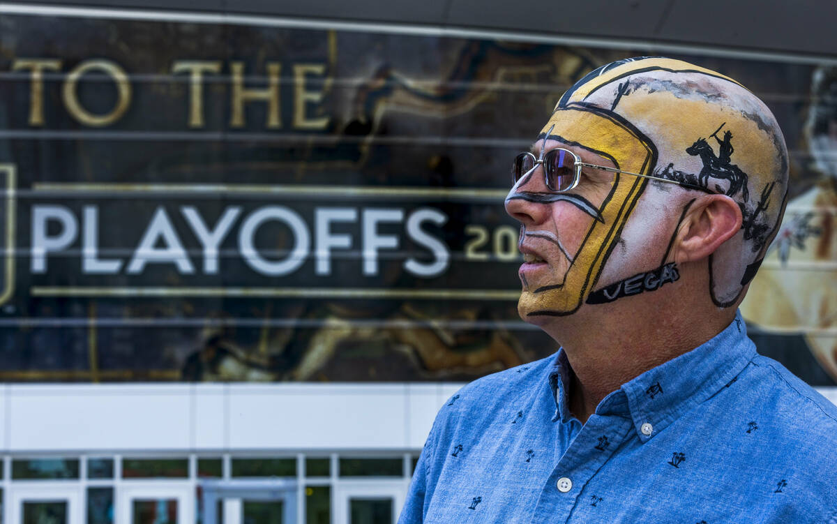 Fan Scott Kirkham from Salt Lake City has his head painted like a helmet during pre-game festiv ...