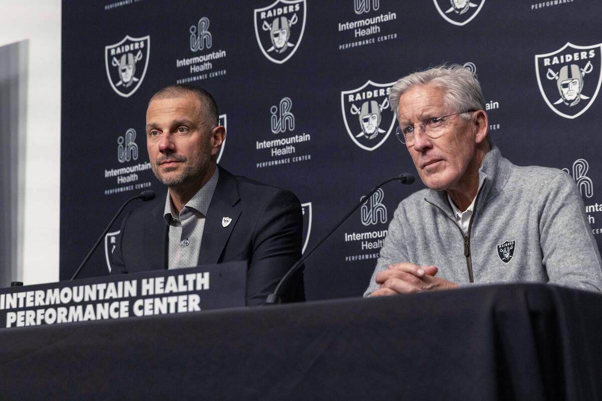 Raiders general manager John Spytek, left, and head coach Pete Carroll take questions from medi ...