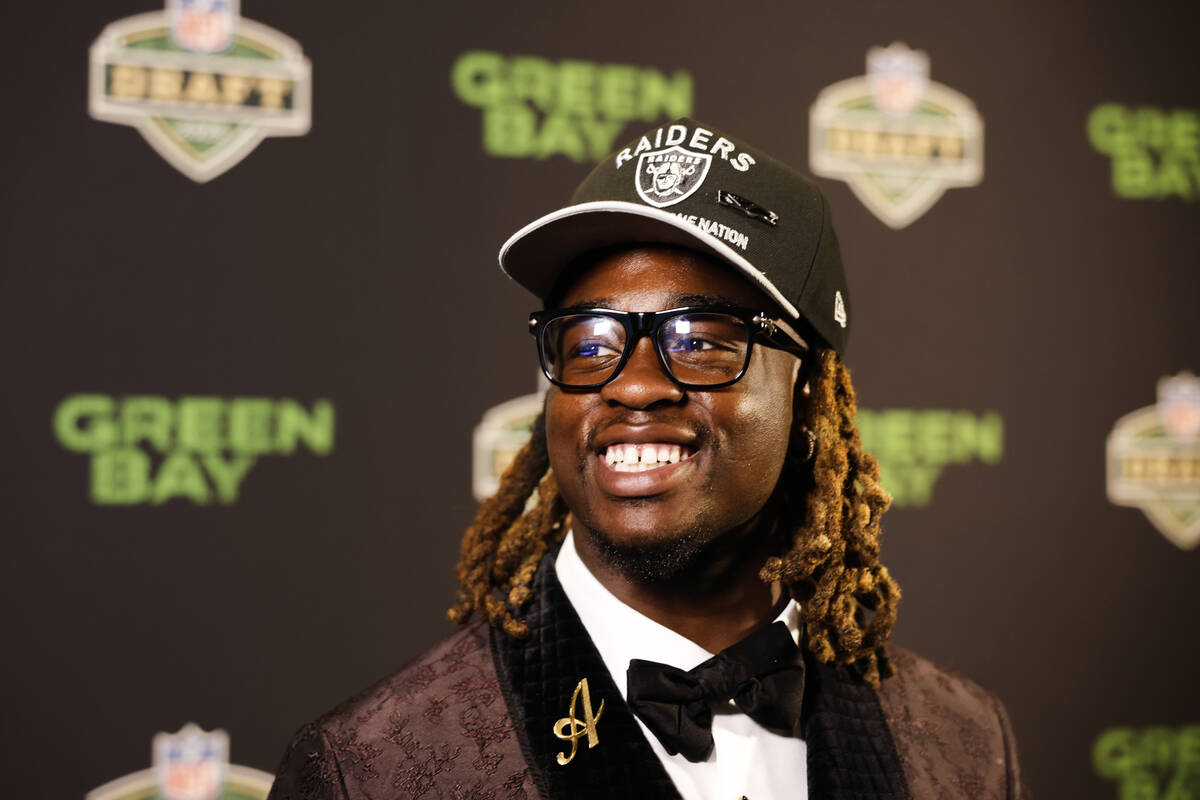 Ashton Jeanty is interviewed by media after being chosen by the Las Vegas Raiders with the sixt ...