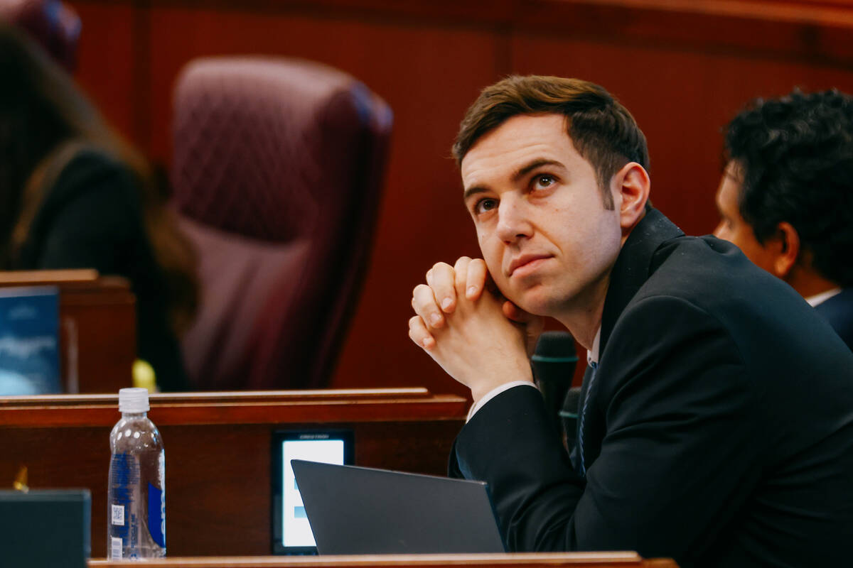 Assemblymember Joe Dalia, D-Henderson, looks up at the screen as Nevada State Assembly convenes ...