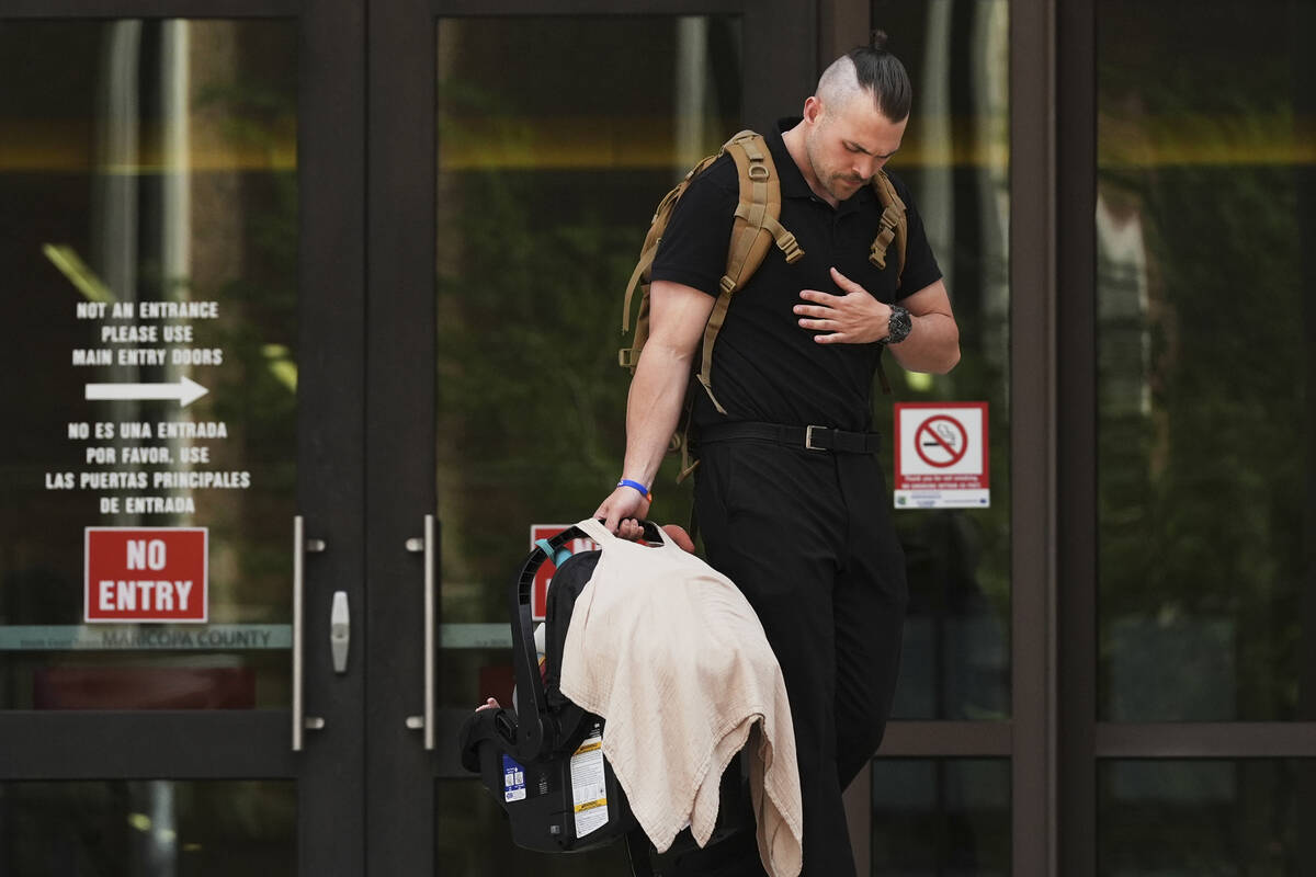 Colby Ryan leaves Maricopa County Superior Court for the murder trial of Lori Vallow Daybell, h ...