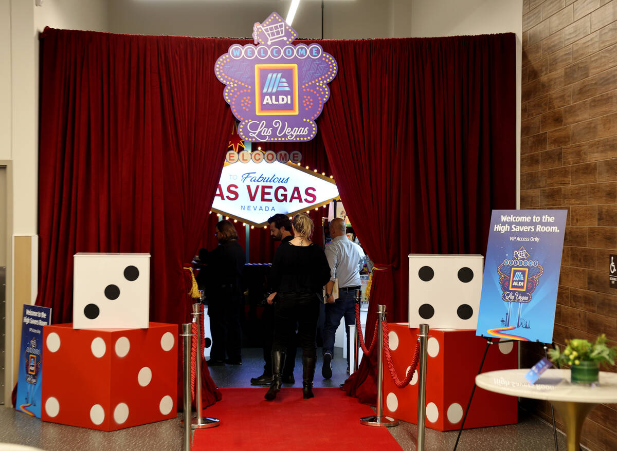 Members of the media check out the High Savers Room for lucky shoppers during a media preview o ...