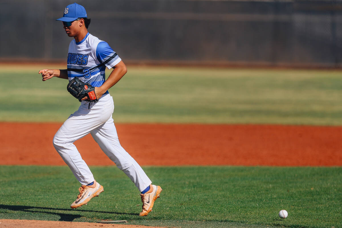 Basic second baseman Tate Southisene runs to the dugout during a high school baseball game betw ...