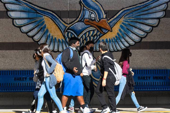 Students at Bailey Middle School walk in the hallway during recess on Friday, Dec. 10, 2021, in ...