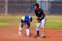 Faith Lutheran infielder Rouselle Shepard (5) celebrates making it to third base during a high ...