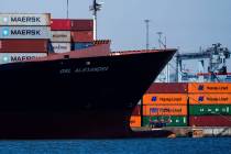 Shipping containers sit on the container ship Alexandra at the Port Newark Container Terminal, ...