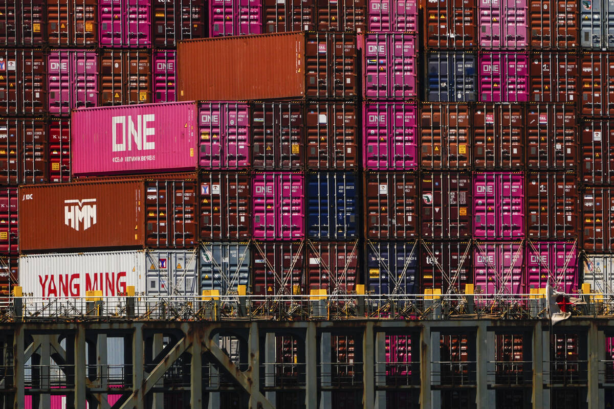 Shipping containers sit on the container ship One Manhattan at Port Jersey, Friday, April 18, 2 ...