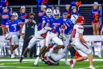 Bishop Gorman defensive back Jett Washington (5) runs back an interception against Arbor View d ...