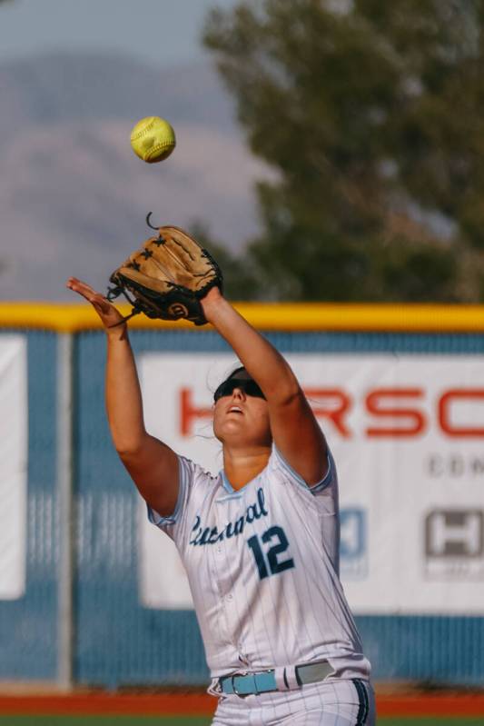 Centennial infielder Campbell Cole (12) catches a pop fly during the softball game against Palo ...