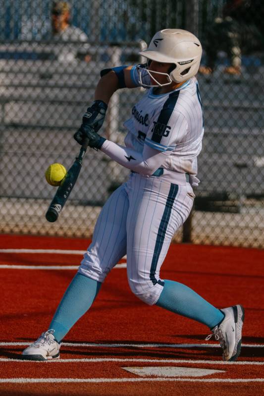 Centennial’s Sloane Merrell (8) hits a pitch during the softball game against Palo Verde ...