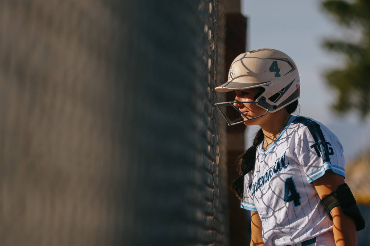 Centennial’s Lily Fournier (4) chats with spectators during the softball game against Pa ...