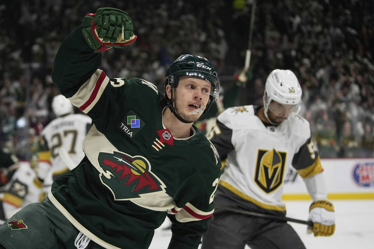 Minnesota Wild center Marco Rossi (23) celebrates after scoring during the first period of Game ...