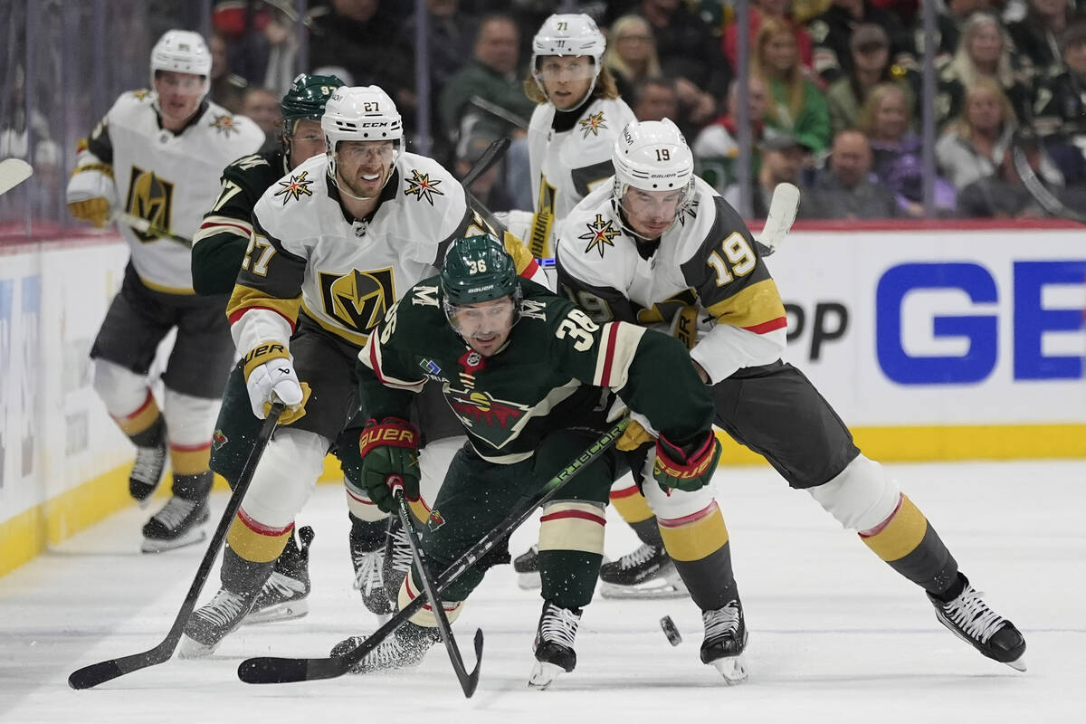 Minnesota Wild right wing Ryan Hartman (38) and Vegas Golden Knights right wing Reilly Smith (1 ...