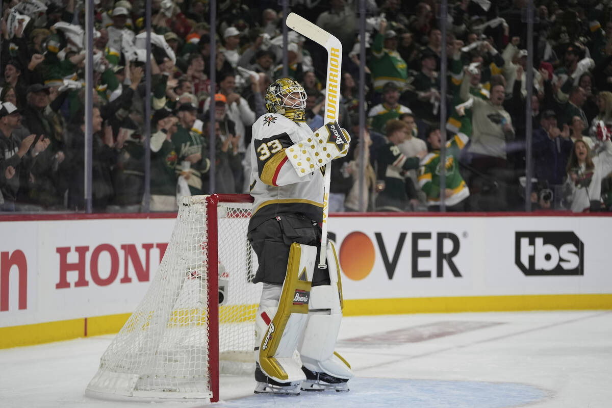 Vegas Golden Knights goaltender Adin Hill (33) stands in the goal after a goal scored by Minnes ...