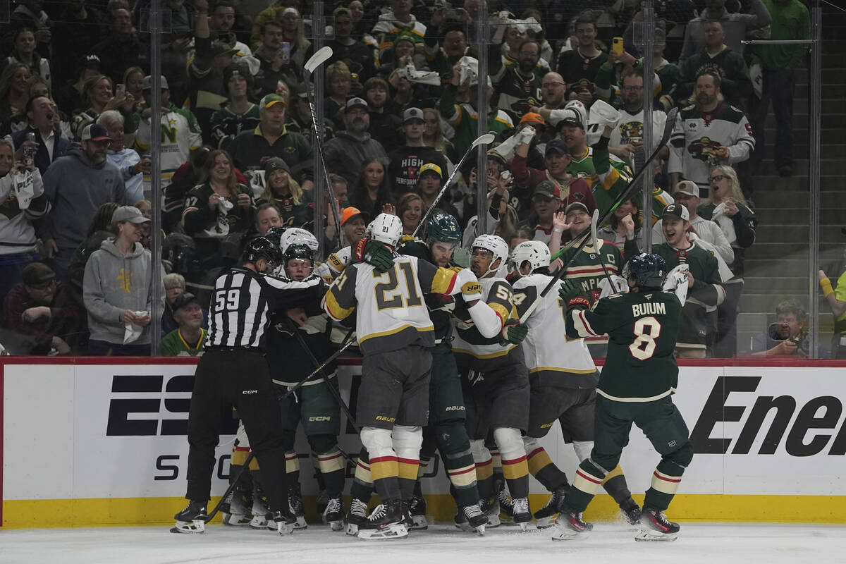 Minnesota Wild and Vegas Golden Knights players get into an altercation during the first period ...