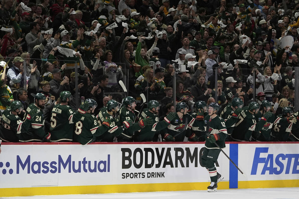 Minnesota Wild left wing Matt Boldy (12) celebrates after scoring during the second period of G ...