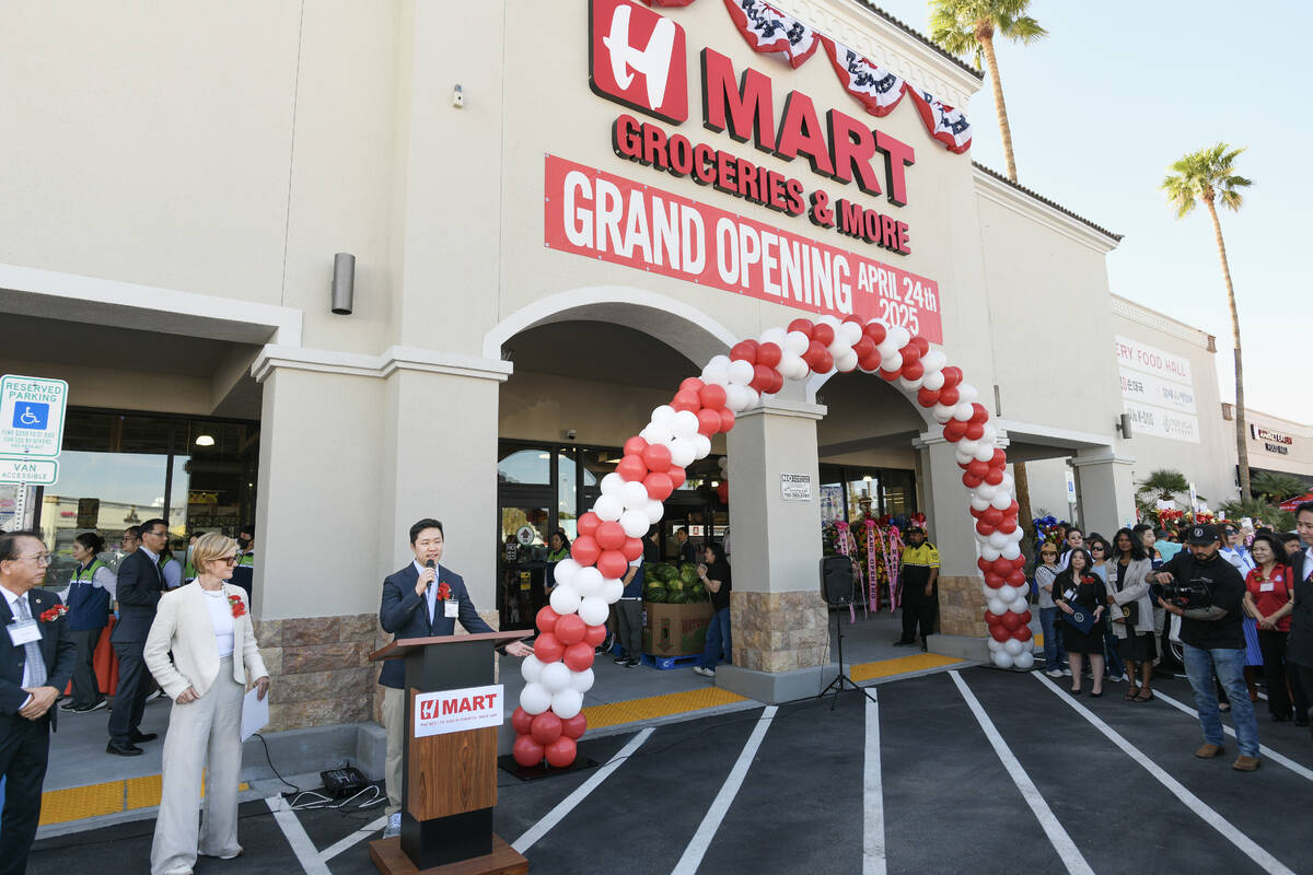 H Mart President Brian Kwon is joined by Rep. Susie Lee, D-Nev, while speaking at the grand ope ...