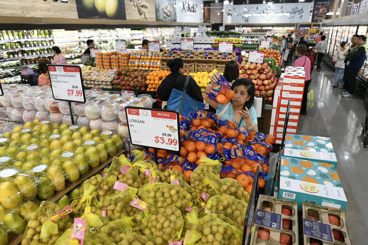 Shopper check out produce during the grand opening of Las Vegas’ first H Mart Thursday, April ...