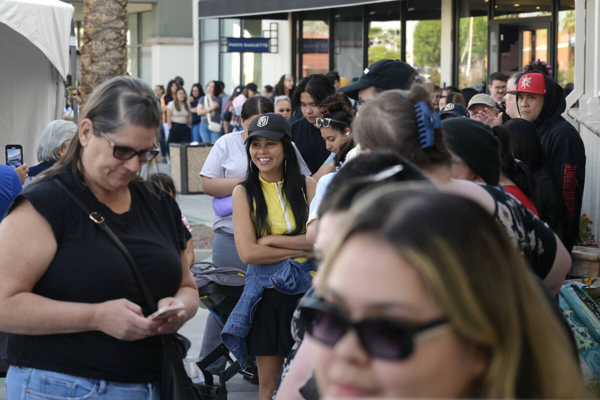 Hundreds of people wait in line for the doors to open during the grand opening of Las Vegas’ ...