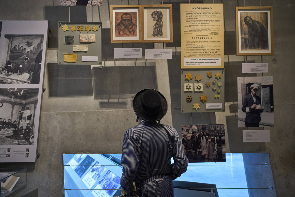 An ultra-Orthodox Jewish man visit the Yad Vashem Holocaust Memorial Museum in Jerusalem, Tuesd ...