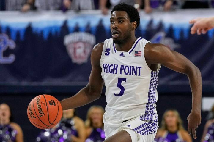 High Point forward Kimani Hamilton (5) plays during the first half of the Big South Championshi ...
