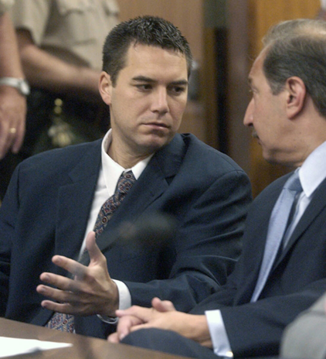 Scott Peterson talks to his defense attorney during a hearing in the murder of his wife, Laci P ...