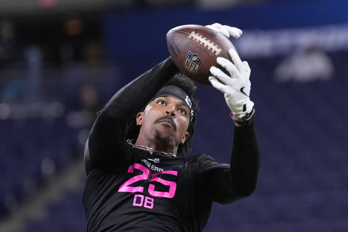 Iowa State defensive back Darien Porter runs a drill at the NFL football scouting combine in In ...