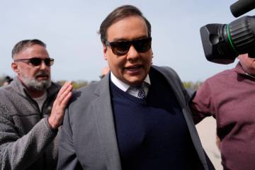 Former U.S. Rep. George Santos arrives at federal court for sentencing, Friday, April 25, 2025, ...