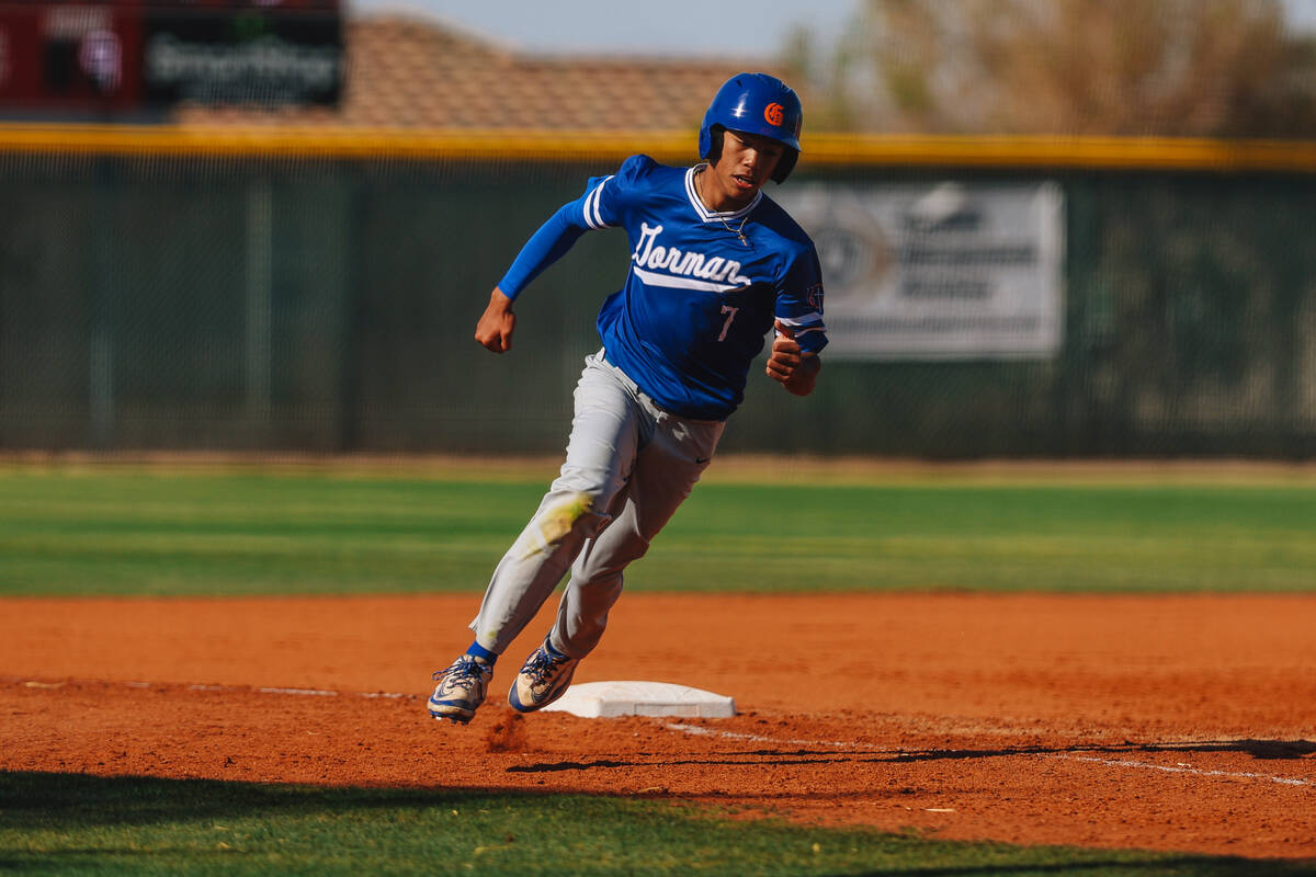 Bishop Gorman’s Nate Gust runs to home base during a baseball game between Desert Oasis ...