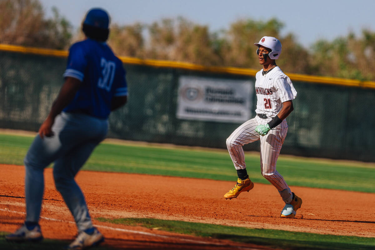 Desert Oasis’ Colin Walsh runs to third base during a baseball game between Desert Oasis ...