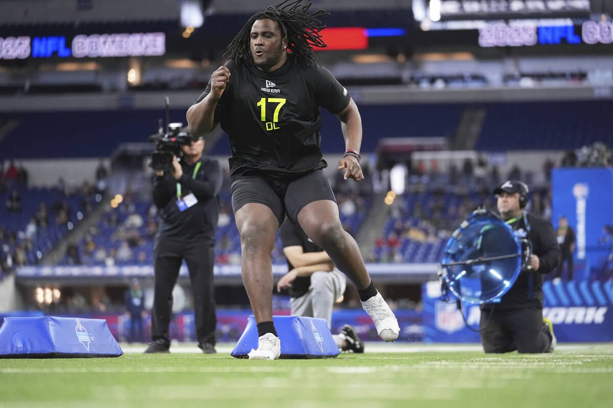 South Carolina defensive lineman Tonka Hemingway runs a drill at the NFL football scouting comb ...