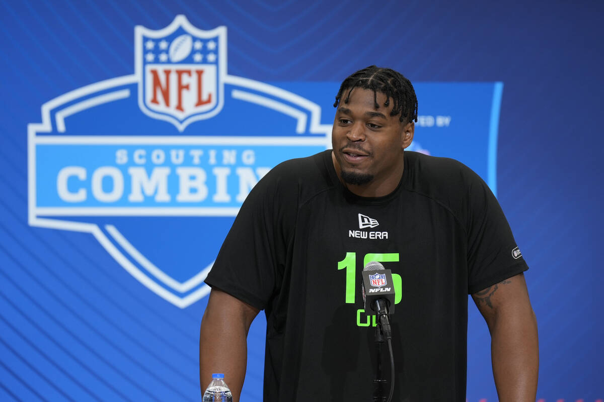 William & Mary offensive lineman Charles Grant speaks during a press conference at the NFL ...